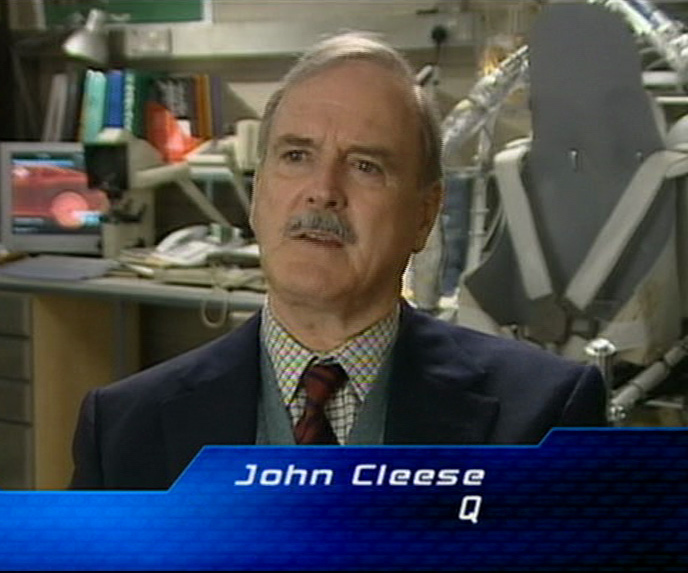John Cleese The World Is Not Enough as Q's assistant, referred to by Bond as R.