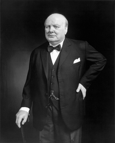 Out of office and politically "in the wilderness" during the 1930s, Churchill took the lead in warning about Nazi Germany and in campaigning for rearmament. On the outbreak of the Second World War, he was again appointed First Lord of the Admiralty. Following the resignation of Neville Chamberlain on 10 May 1940, Churchill became Prime Minister. His steadfast refusal to consider defeat, surrender, or a compromise peace helped inspire British resistance, especially during the difficult early days of the War when Britain stood alone in its active opposition to Hitler. Churchill was particularly noted for his speeches and radio broadcasts, which helped inspire the British people. He led Britain as Prime Minister until victory over Nazi Germany had been secured. 